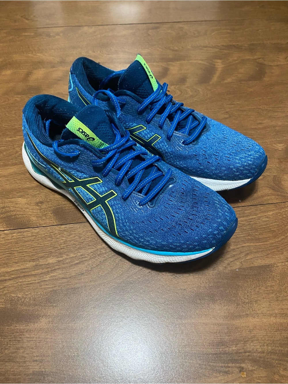 Asics Men's Blue Running Shoes with Neon Green Accents